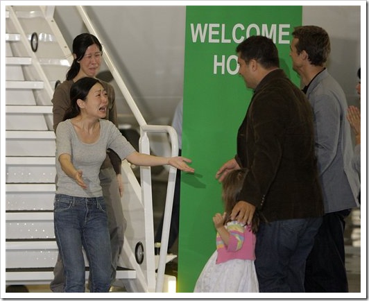 After N. Korea pardon, freed journalists home in US 